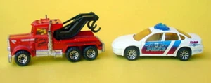 2 Matchbox 1981 Eddie’s Wrecker Peterbilt Tow Truck & Police Car Diecast Lot - Picture 1 of 12