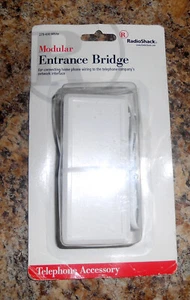 Radioshack Telephone Modular Entrance Bridge 279-430 White NEW SEALED - Zdjęcie 1 z 4