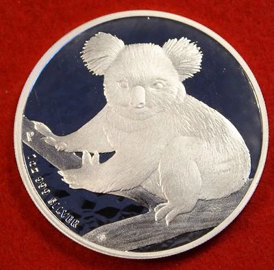 Moneda de coleccionista de lingotes redondos de plata 0,999 % diseño koala australiano 2009 de 1 oz  Foto 1 de 2