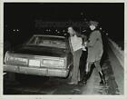 1983 Press Photo Massachusetts State Trooper Brian Kennedy making an arrest.