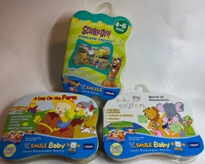 V. Smile Baby System Vtech A Day on the Farm Baby Einstein  and Scooby Doo Lot - Image 1 of 2