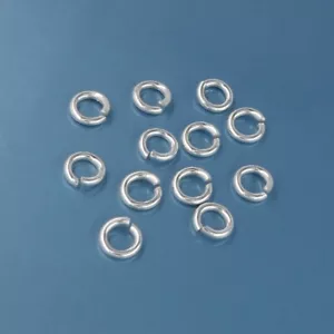 12 conectores de anillo de salto abierto de plata esterlina maciza de 5 mm x 1 mm (calibre 18) #33155 - Imagen 1 de 2