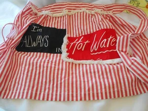 DEKOLAM-''I'AM ALWAYS IN HOT WATER'' 18.5''X73'' TIE RED /WHITE STRIPED APRON - Picture 1 of 2