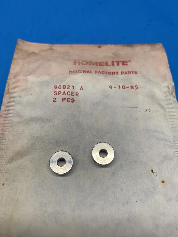 (2) GENUINE HOMELITE ST80 ST100 ST120 MUFFLER EXHAUST SPACER 96821-A NEW OEM B15 - Image 1 of 1