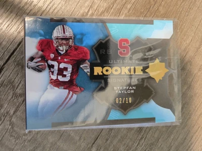 2013 Ultimate Collection Gold #163 Stepfan Taylor AUTO RC #ed 02 / 10 - Image 1 of 3