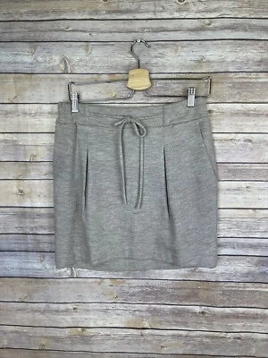 Falda para mujer Calypso St. Barth XS 100 % lana bolsillos plisados beige lazo cintura Foto 1 de 4