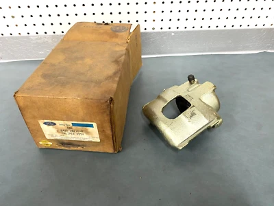 Ford OEM NOS E43Z-2B120-A Passenger Side Brake Caliper Assembly 1984-1994 Tempo - Image 1 of 4