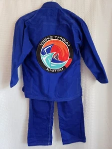 Chaqueta y Pantalones Triple Amenaza Jiu Jitsu K2 Azul JUVENIL Equipo de Rendimiento Proma - Imagen 1 de 5