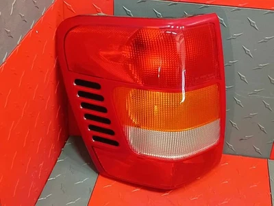 Conjunto de luz trasera izquierda para conductor Jeep Grand Cherokee 99-03 OEM Foto 1 de 4