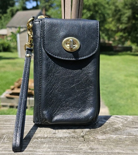 Portafoglio Coach da polso in pelle nera con chiusura a scatto