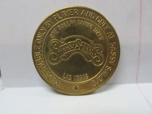 SASSY SALLY'S HOTEL CASINO $1 ONE DOLLAR GAMING COIN/TOKEN - Picture 1 of 2
