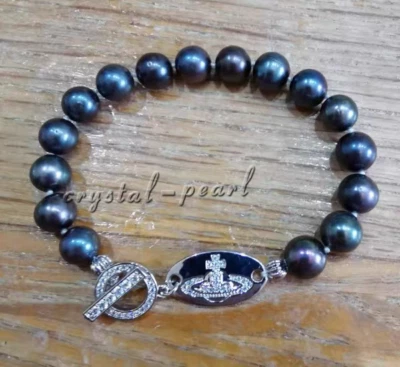 BONITO Impresionante BRAZALETE DE PERLAS 10-11MM AAA Mar del Sur Negro Azul 7.5-8" 925s Foto 1 de 3