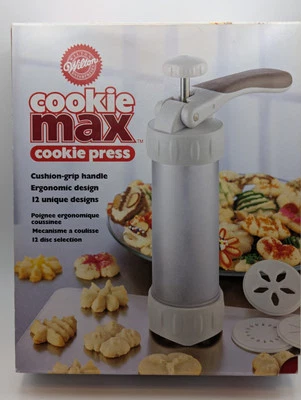 Prensa de galletas Wilton Cookie Max con 12 diseños, nueva en caja  Foto 1 de 3