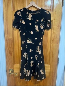 Damen-Clochette-Minikleid Reformation schwarz Blumenmuster Größe Medium - Bild 1 von 8