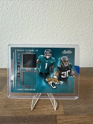2021 Panini Absolute #TTM-JCK Travis Etienne/James Robinson Dual Patch 023/199 - Image 1 of 2
