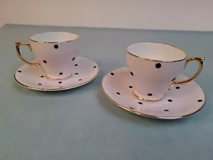 Set 2 tazze da tè e piattini Clarence Bone China England rosa con pois neri - Foto 1 di 19