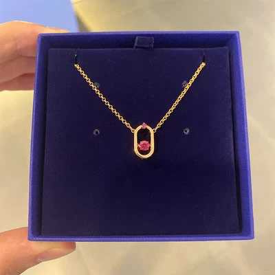 Новый в коробке GIft Una подвеска круглой огранки, овальной формы, красный с золотым тоном - Изображение 1 из 4