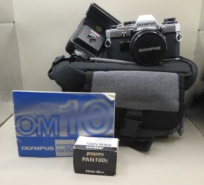 Olympus OM10 35mm SLR Film Camera, 50mm f1.8 Lens, flash, expired film and bag - Image 1 of 4