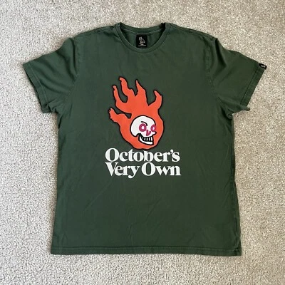 Camiseta October's Muy Propia Drake Calavera Llameante Para Hombres GRANDE Verde Ejército Gráfico Usada en Excelente Condición Foto 1 de 4