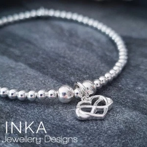 925 Sterling Silver stretch beaded Stacking Bracelet with Infinity charm by INKA - Picture 1 of 8