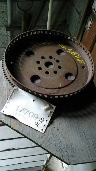 00 01 02 03 04 KIA SPECTRA FLYWHEEL/FLEX PLATE A.T. FLYWHEEL 1.8L 4 CYL 4921 - Image 1 of 1