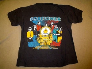 MAGLIETTA VINTAGE STRANIERO TOUR CONCERTO 1978 MANICHE CORTE ~ TAGLIA ? - Foto 1 di 6