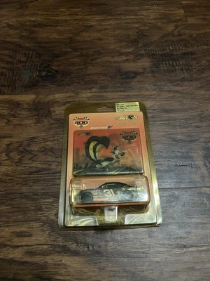 2002 Robby Gordon #31 Cingular Looney Tunes Rematch Chevy NASCAR 1/64 Diecast - Image 1 of 4