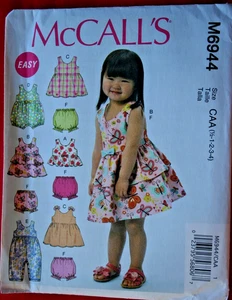 McCall Pattern M6944 Toddlers' Top Dresses Rompers and Panties Size 1/2 -1-2-3-4 - Picture 1 of 2