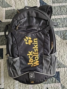 Mochila Jack Wolfskin Velocity 12 negra con cubierta de lluvia ligeramente usada (A2) - Imagen 1 de 7