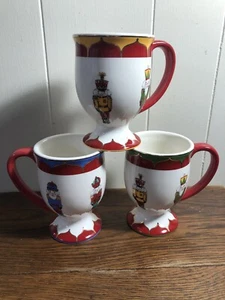 (3)KATE WILLIAMS Global Design Ceramic Christmas NUTCRACKER Coffee Mugs 5"  READ - Picture 1 of 6