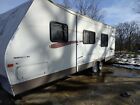 A well kept 27 foot trailer fully equipped kitchen, one slide and one full bath.