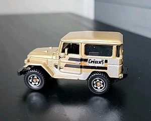 Matchbox 2013 Toyota Land Cruiser Car Truck SUV FJ40 Gold MBX Explores Mountain - Picture 1 of 8