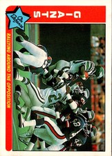 1985 Fleer Team Action Rallying Around the Opposition (Defense) Football Card