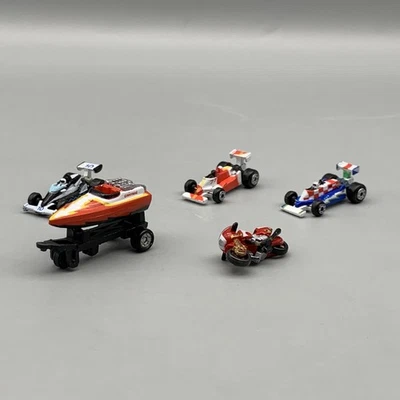 Vintage 1980s Micro Machines Galoob Lot Of Race Cars Motorcycle Boat & Trailer - Image 1 of 4