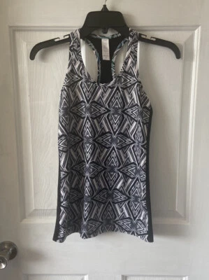 Camiseta sin mangas Ivivva para niñas en blanco y negro con estampado geométrico atlético para niñas talla 12 Foto 1 de 4