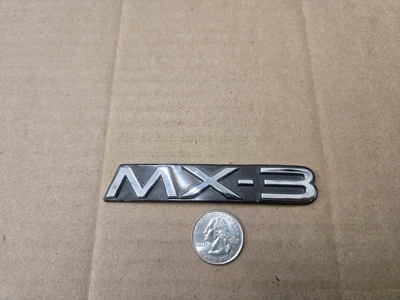 Mazda OEM 1992-1996 MX-3 maletero trasero emblema insignia logotipo placa de identificación nombre insignia Foto 1 de 2