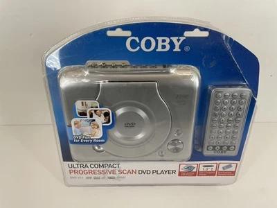 Reproductor de DVD portátil Coby Ultra Compact Progressive Scan DVD-211 (Nuevo) Foto 1 de 4