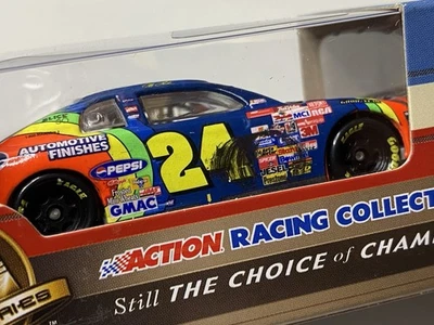 NIB 1/64 Action NASCAR Diecast 1997 Jeff Gordon #24 DuPont Daytona Raced Win - Image 1 of 4