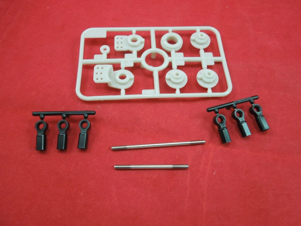 NEW TAMIYA LUNCHBOX / MIDNIGHT PUMPKIN SERVO SAVER parts p  + STEERING RODS  - Image 1 of 1