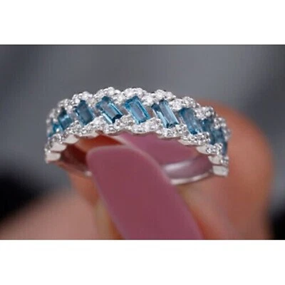 Impresionante anillo de boda baguette simulado topacio azul enchapado en oro blanco de 14 k Foto 1 de 4