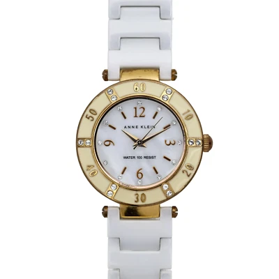 Reloj Anne Klein con bisel de diamantes y oro cerámico blanco para dama Foto 1 de 4
