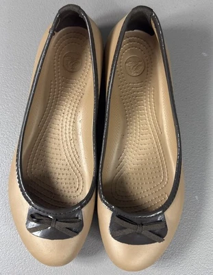CROCS Lily Shoes Women Size 9 Ballet Flats Gold Brown Bow Style 10510 Gentle Use - Image 1 of 4