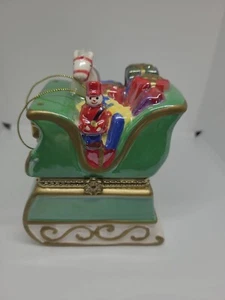 Mr Christmas musikalischer Weihnachtsmannschlitten mit Spielzeug animiertes Ornament aufklappbar Porzellan  - Bild 1 von 9