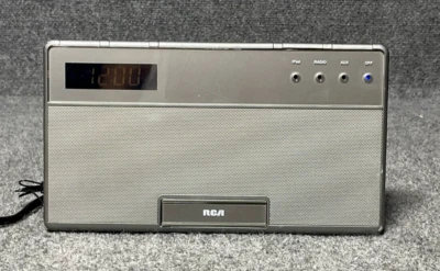 ⏰ RCA Digital Alarm Clock Radio RC65I-A & Charging Dock for iPod/iPhone – Gray - Image 1 of 4