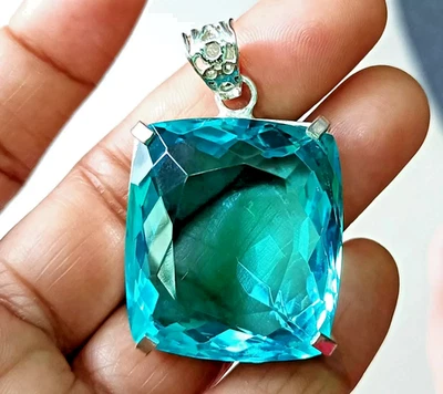 Colgante de plata maciza 925 con topacio azul natural certificado 95 CT+ piedras preciosas sueltas Foto 1 de 4
