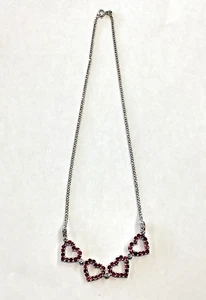Collana in oro bianco 18 kt con rubini e diamanti cuore - Foto 1 di 7