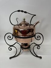 Unusual antique copper kettle on an ornate wrought iron stand. Original burner