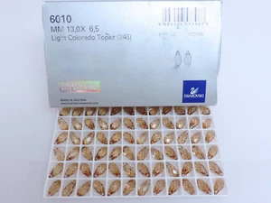 12 Pcs SWAROVSKI® Crystal Briolettes, ART#6010 13x6.5mm Pendants, LT COL TOPAZ   - Picture 1 of 3