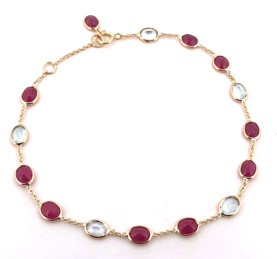 Bracciale in oro giallo massiccio 18kt con rubini naturali e acquamarina deli... - Immagine 1 di 3