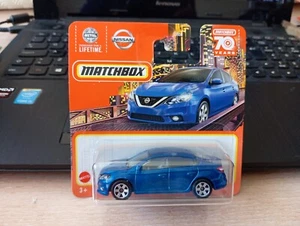 MATCHBOX - NISSAN SENTRA 2016 BLU 1/64 APROX *NUOVO* - Foto 1 di 4